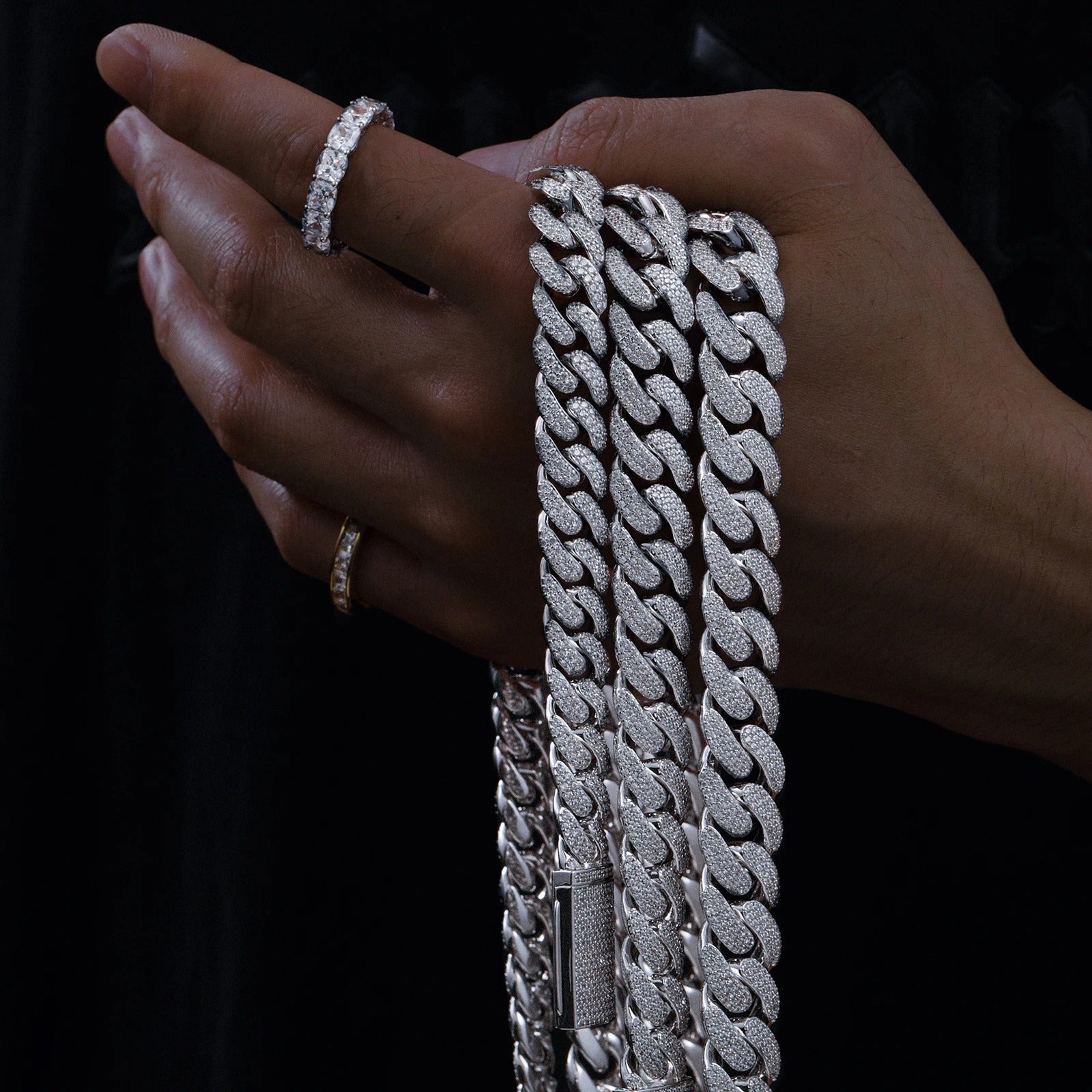 Moissanite Cuban Link Chain held on hand